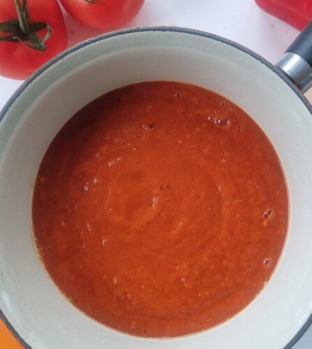 rich tomato sauce in a saucepan