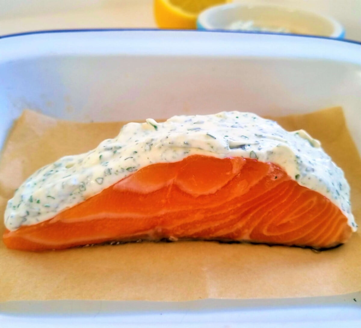 raw salmon with creamy herb topping
