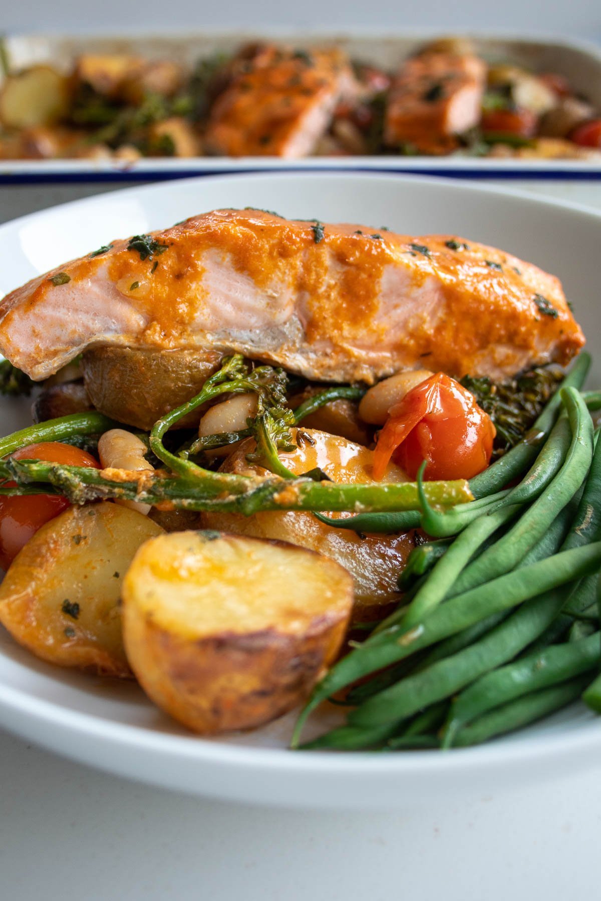 Thai salmon traybake plated up with green beans