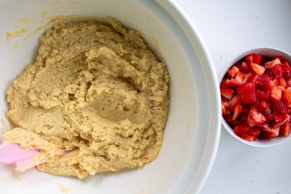 cake batter with chopped strawberries