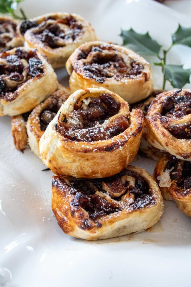 a platter of cooked puff pastry mincemeat pinwheels