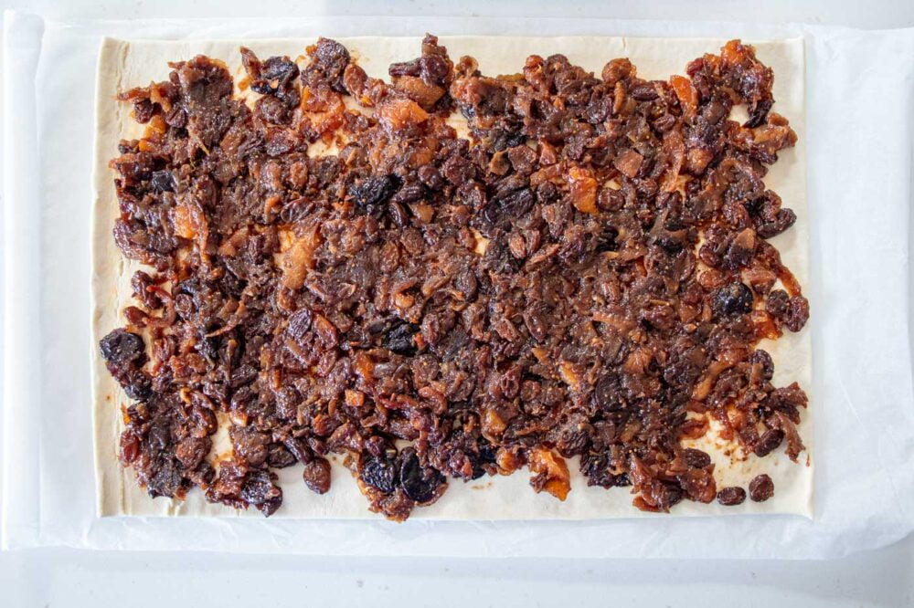 mincemeat spread over a flat rectangle of pastry