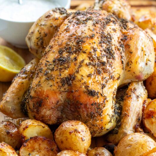 Greek Roast Chicken with Garlic Roast Potatoes