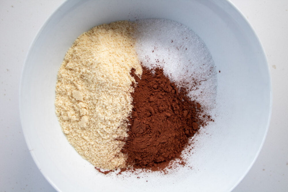 ground almonds, cocoa powder and xylitol in a bowl