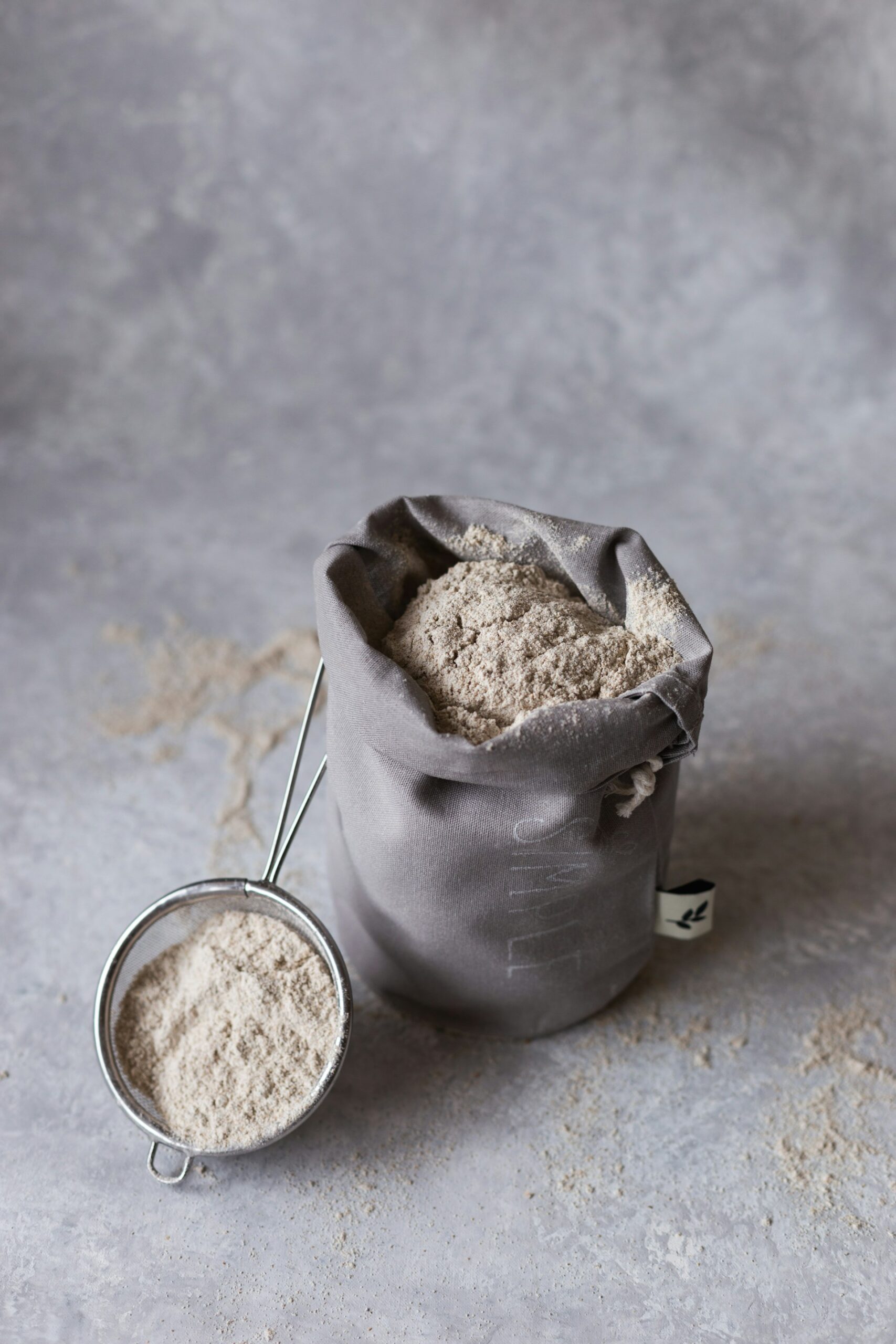 a small bag of flour and sieve