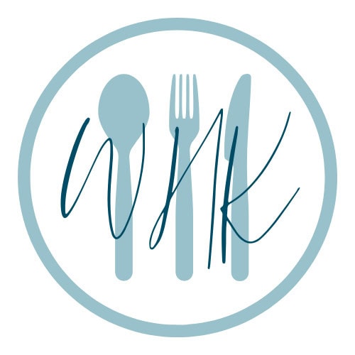 WHK Brand logo - a light blue circle with a spoon,, fork and knife inside with WHK written over the top